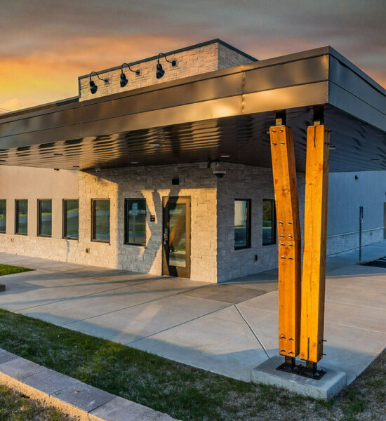 Thrive Medical Cannabis Dispensary in Branson West Exterior View With Sun in Background